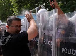 Albanian police use tear gas and pepper spray as Tirana protest turns violent