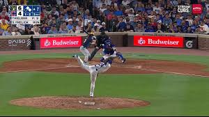 Christian Yelich celebrates after hitting a home run against the Chicago Cubs
