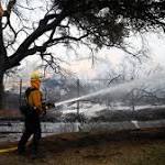 California fires: Firefighters hold containment