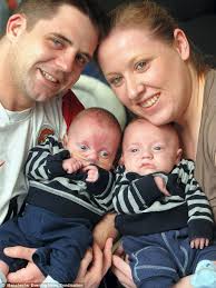 Proud parents: Gareth James and Kelly Hough hold their twin sons Billy (left) and Kaydon. Ms Hough said: &#39;it was amazing that they made it and we couldn¿t ... - article-0-11C31FBC000005DC-340_634x845