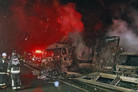 A massive crash on a highway in Japan kills 2 people and injures 26 as the holiday season starts