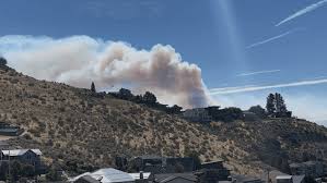 'Get Out Now' evacuations : Chelan Hills fire jumps canyon and spreads northeast