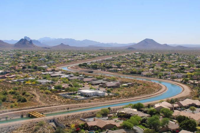 Arizona's taps won't run dry, but water bills will go up under federal plan for Colorado River; mandatory cuts of 27% start Jan. 1