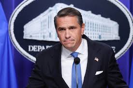 Attorney General Todd Blanche speaking during a Justice Department news conference