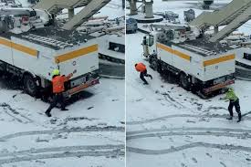 Plane Passenger Captures ‘Wholesome’ Video of Airport Staff Having a Snowball Fight amid Winter Storm