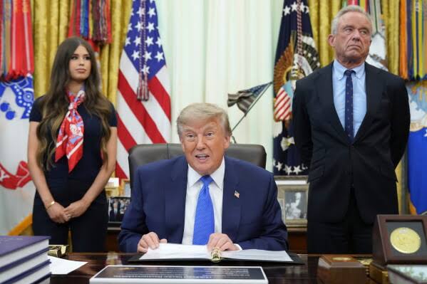 Trump signs executive order on childhood vaccines, requiring millions of individual shots last used decades ago; experts condemn plan