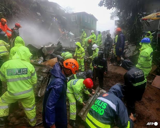 Heavy rain kills at least 16 in Philippines as floods and landslides hit Luzon; rescue efforts continue manually amid ongoing downpour