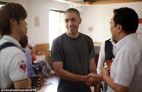 Image result for mark obama half brother