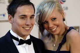British Olympic gymnast Daniel Keatings poses on the red carpet with his partner at the British Olympic Ball at Grosvener House hotel on September 24, ... - British%2BOlympic%2BBall%2BArrivals%2BWCGB4bswMecl