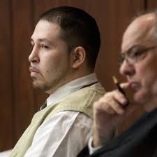View full sizeRico A. Saldana, 22, and his attorney James Piazza listen to testimony during his and Michael D. Lawrence&#39;s trial before Saginaw County ... - -96f5fdb27b972172