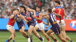 AFL Grand Final 暴雨中 MCG 如何支撑 Kylie 中场演出与 10 万人现场安全