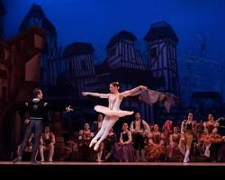 Image of Stage lighting illuminating actors on stage