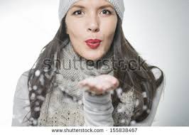 Attractive young brunette woman in warm winter fashion blowing snowflakes or magic dust off her palm attractive young brunette woman . - stock-photo-attractive-young-brunette-woman-in-warm-winter-fashion-blowing-snowflakes-or-magic-dust-off-her-155838467
