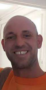 Children of man hacked to death with a machete pay tribute to their 'beloved dad'