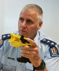 READY TO FIRE: Northland district Taser co-ordinator, Inspector Murray Hodson, with one of the new Tasers. - 3487093