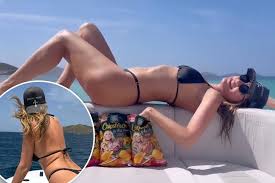 Heidi Klum wore a thong bikini to promote her new potato chips