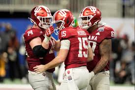 Who is performing the national anthem at the College Football Championship?