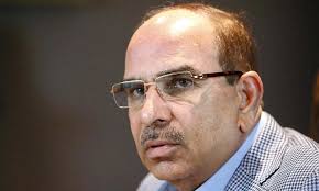 Why has Interpol issued red notices for Malik Riaz and his son?