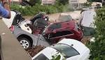 WATCH: Cars swept away by floodwaters at New Jersey car dealership