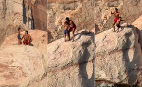 https://people.com/dad-who-threw-son-7-off-cliff-address-viral-video-criticism-exclusive-11804429