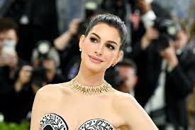 Anne Hathaway Debuts Her Baby Bump in Public as She Sunbathes in a Nearly $700 Bikini