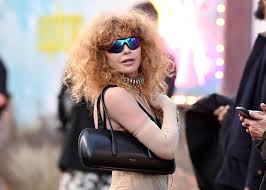 Natasha Lyonne Frees the Nipple in Completely Sheer Bodysuit and Lace-Up Shorts