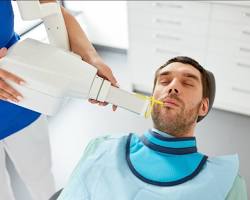 Image of Dental assistant taking xrays