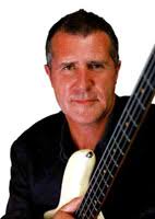 Renowned for his sureness of timing and tone, John Illsley was the bass player ... - john-illsley_s