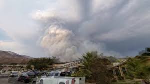 RAW: CA: LARGE SMOKE PLUME FROM LINE FIRE