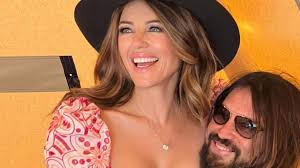 Elizabeth Hurley wears nothing but gold necklace to celebrate 60th birthday: 'The love of my life,' Billy Ray Cyrus declared
