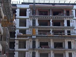 Un bloc de 9 etaje, construit ilegal, blochează o instalație NATO în România