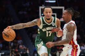 Amir Coffey Secures Spot on Milwaukee Bucks Roster; Tyler Smith Waived