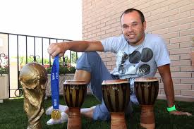 Image result for PIC OF INIESTA WITH TROPHY