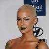 Et comme si cela ne suffisait pas, Amber Rose moule sa silhouette dans une robe léopard. - 654391-amber-rose-lors-de-la-soiree-100x100-3