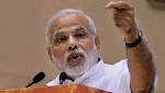 Modi takes veiled shot Lalu,