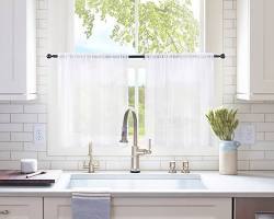 Image of kitchen with sheer curtains