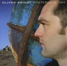 Mysterious Day is Oliver Knight&#39;s first solo project and, in truly typical fashion, it is a collaboration with others. The vocals on the album are handled ... - TSCD528-web