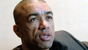 Image result for mark obama half brother