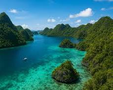 Image of hidden paradise hidden gem destination Indonesia remote beach turquoise water and green hills 2026 travel photo