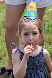 Maggie Padavan competing in the lollipop licking contest at the Big Duck 80th birthday celebration on ... - webnBigDuck8