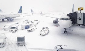Hundreds of flights cancelled at major airport as blizzard dumps heavy snow