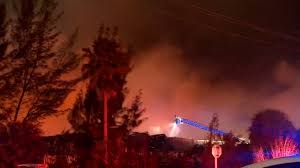 Crews battling 5-alarm warehouse fire near Turnpike in NW Miami-Dade