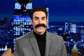 Watch Sacha Baron Cohen Pretend to Moderate Presidential Debate as Ali G 
and Borat