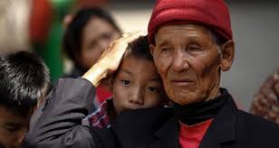 The father of Nepalese mountaineer Ang Kaji Sherpa, who died in an avalanche on Mount Everest on Friday. Photograph: Narendra Shrestha/EPA - image