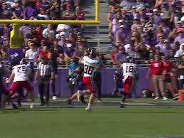 Texas Tech's Reese Burkhardt FAKES the field goal attempt and runs it in 
for a TD vs. TCU