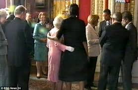Image result for queen's rests hand on michelle obama back