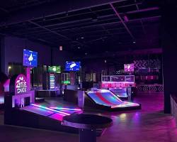 Image of Putts and Pins West Des Moines mini golf course neon