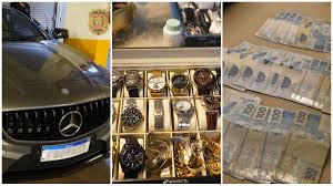 Polícia apreende carros de luxo, coleção de relógios e maços de dinheiro de rede ilegal de anabolizantes