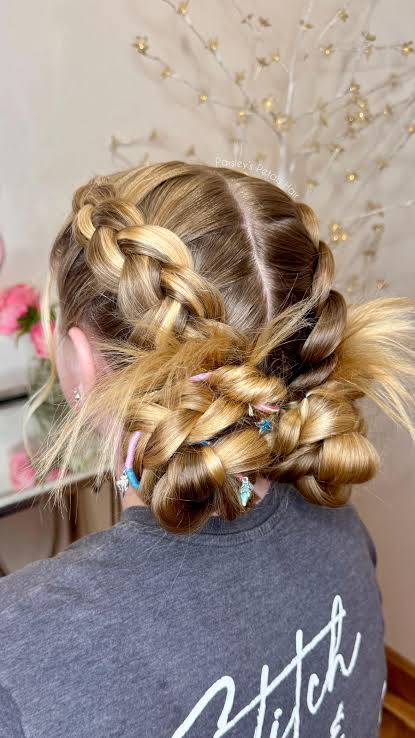 Loving these double Dutch braids into braided buns! Such a fun ...