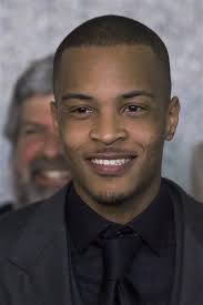 T.I., Clifford Harris FILE - In this Friday, March 27, 2009 file photo, Rapper T.I., born Clifford Harris Jr., speaks to reporters after being sentenced to ... - ti-clifford-harris-a808efb43c615a85